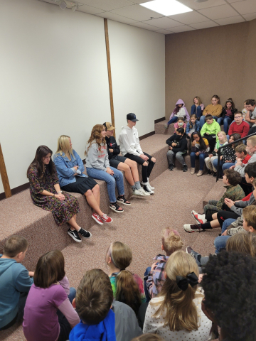 MMHS students answer questions of elementary students.