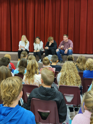MMHS students answer questions of elementary students.