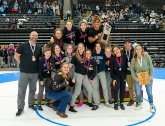 Girls wrestling team takes 1st in state.