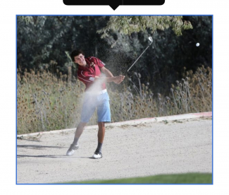 Maple Mountain High School golf team member hitting a golf ball with his club.