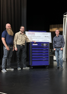 Mr. Massic won a check and toolbox